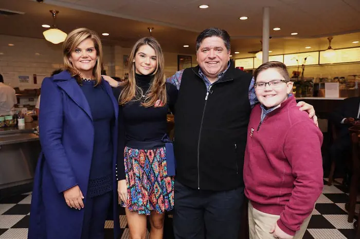 J.B. Pritzker with his wife, M.K. Pritzker, and their children T